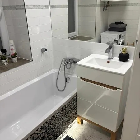 Blisko Deptaku Apartman